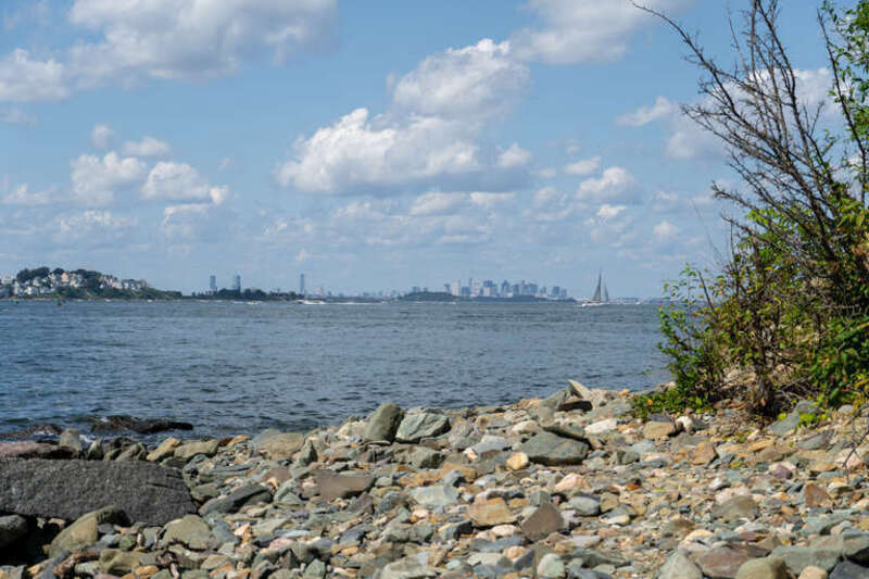 Boston skyline from shore of Webb Memorial Park