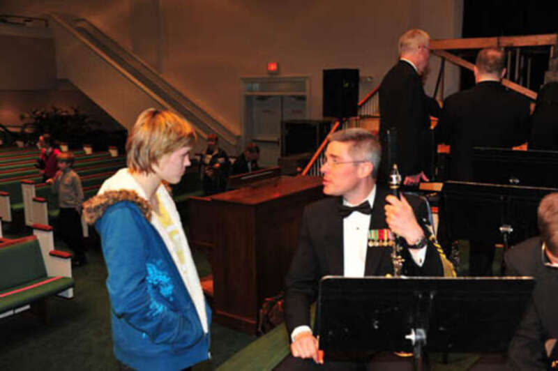 100322-N-2257C-004 MARTINEZ, GEORGIA (March 22, 2010) Master Chief Musician Michael McDonald, right, concert master and clarinet instrumentalist for the Concert Band, meets with a young clarinetist who expressed her desire to one day be a part of the