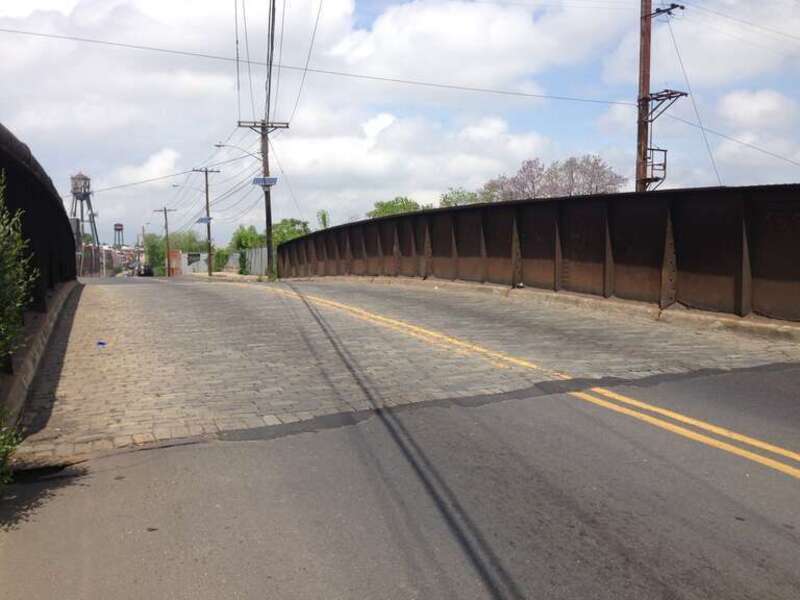 Overpass with a sett surface carrying Olden Avenue (Mercer County Route 622) over the Northeast Corridor rail line in Trenton, New Jersey