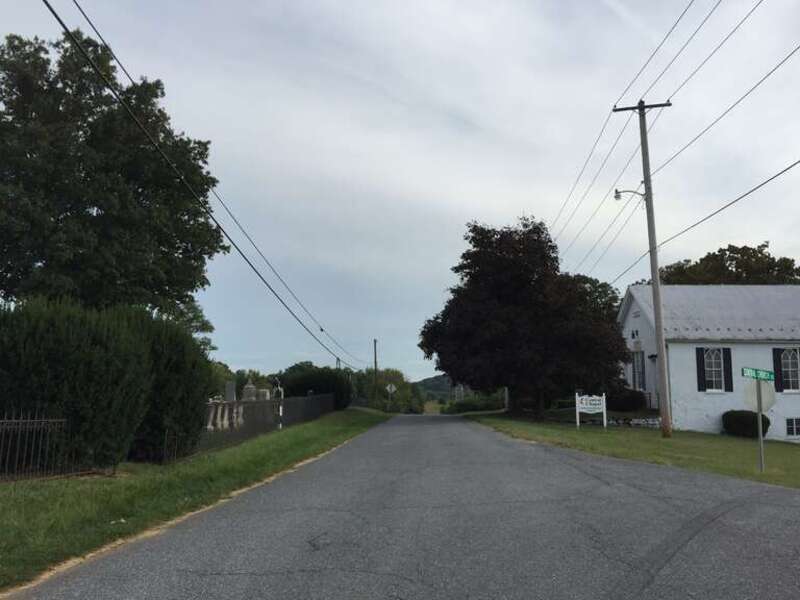 View south along Maryland State Route 874 (Drummine Road) at Central Church Road in Central Chapel, Frederick County, Maryland