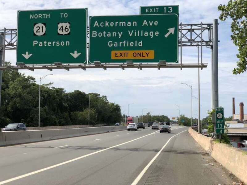 View north along New Jersey State Route 21 (McCarter Highway) at Exit 13 (Ackerman Avenue, Botany Village, Garfield) in Clifton, Passaic County, New Jersey