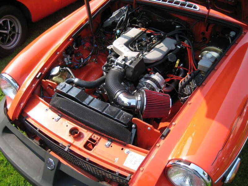 The narrow 60 degree engine fits pretty easily.  

More pictures from the spring car show in Bellingham Washington.