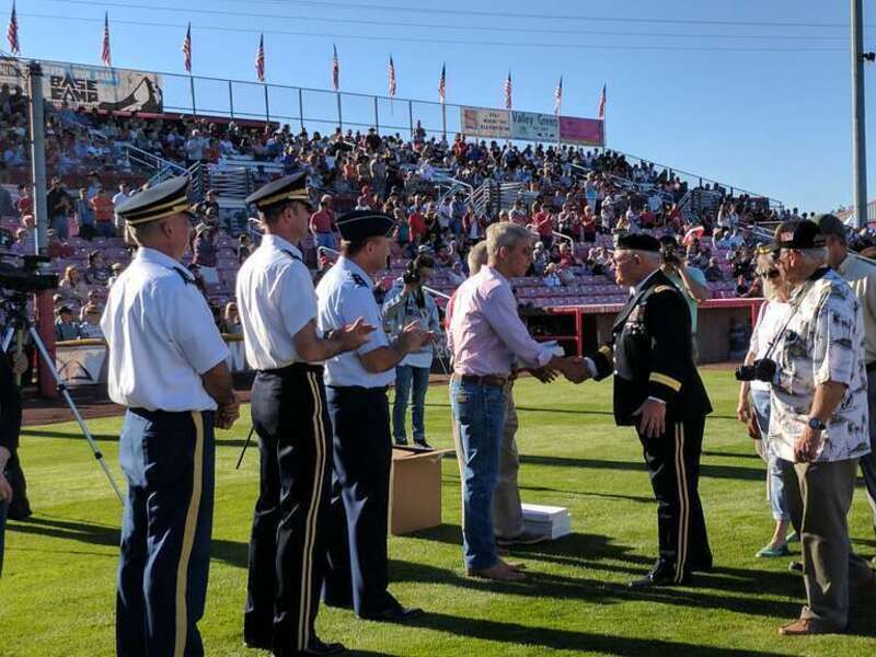 Maj. Gen. Michael E. Stencel (third from left), Adjutant General, Oregon; Brig. Gen. William Edwards (second from left), Oregon Army National Guard Land Component Commander; and Oregon National Guard Chaplain Scott Delbridge (left), together, with