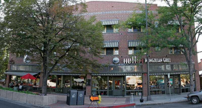 The east elevation of the Armstrong Hotel. Image comprised of two photos stitched together.