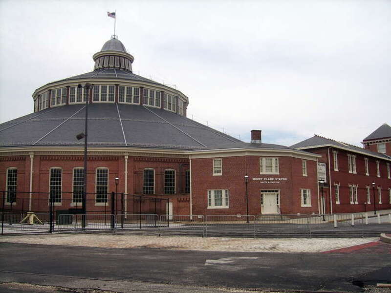 Mount Clare Station and Rundhouse. Mount Clare Station opened in 1830 by the Baltimore &amp;amp; Ohio Railroad - first railroad station in US. The current structure dates from 1851. The adjacent roundhouse designed by Ephraim Francis Baldwin was built in