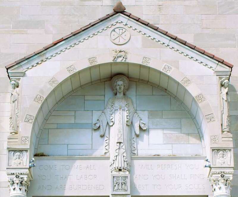 The tympanum above the main entrance in the Basilica of St. John in Des Moines, Iowa.