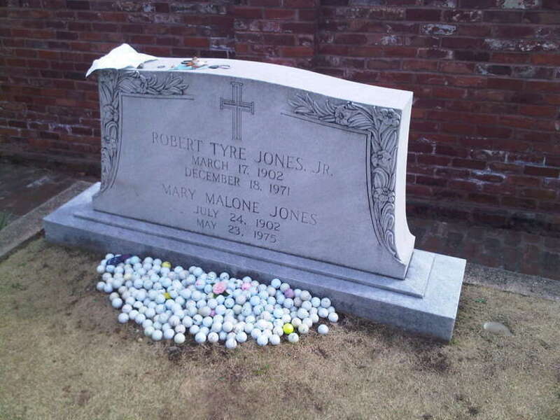 The grave of Bobby Jones (golfer) in historic Oakland Cemetery in Atlanta, Georgia.  Note the golf hole to the lower right.  Text: &quot;Robert Tyre Jones, Jr. / March 17, 1902 / December 18, 1971 / Mary Malone Jones / July 24, 1902 / May 23, 1975&quot;