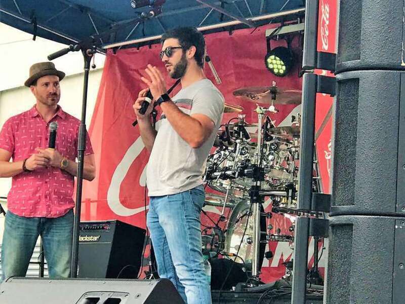 Daniel Suárez on the Coca Cola Racing Family stage during Speed Street in downtown Charlotte, NC