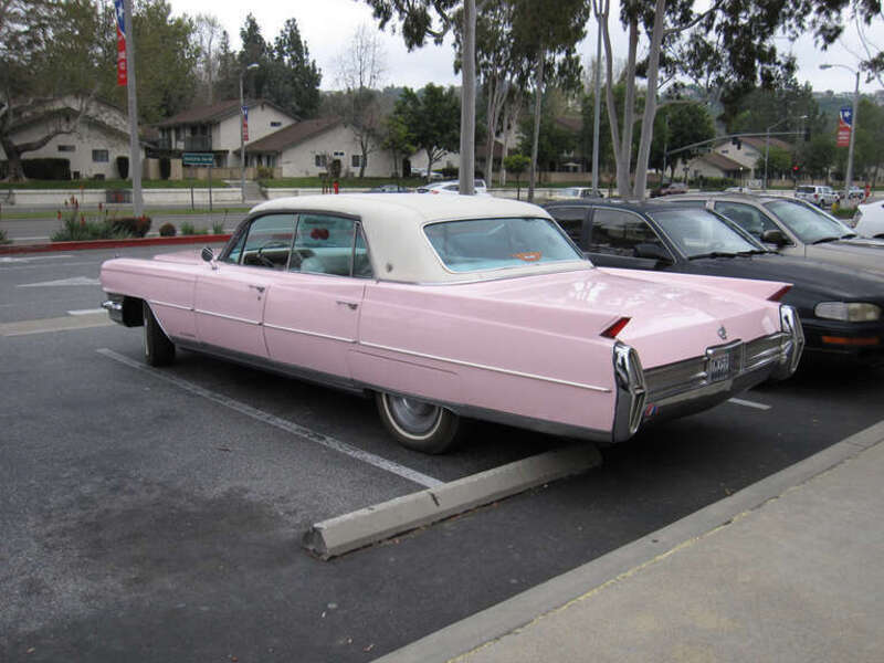 A pink Cadillac, just like in the movies... And a solid pink, unlike the metallic mauve used by Mary Kay saleswomen.

This car has a few battle scars but is otherwise in mint condition. Even the white leather interior is in excellent condition