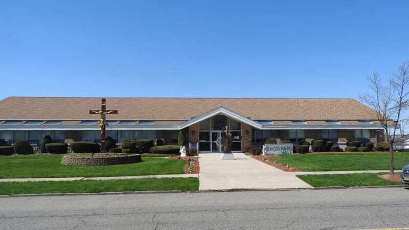Looking northwest at Boys Town building on a sunny midday