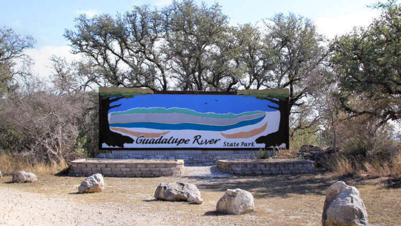 The sign at the entrance to Guadalupe River State Park, Texas, United States.
