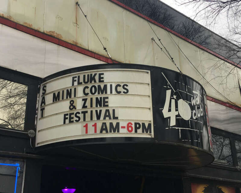 The banner outside the 40 Watt Club in Athens, Georgia in 2018, advertising the annual FLUKE Mini-Comics &amp;amp; Zine Festival.