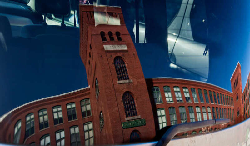 A reflection of this former mill in the rear window of our Toyota Highlander.  In addition to the farmers' market and flea market it houses several businesses, two restaurants, a  radio station, an antique store and more.  

Fort Andross was a