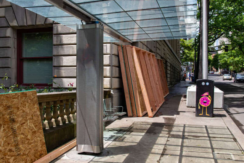 Removal of temporary (24-hour) wall surrounding Portland City Hall (Oregon) during George Floyd protests in Portland, Oregon.