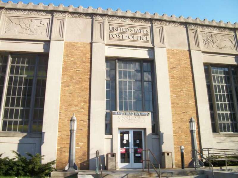 The front doors of the historic United States Post Office building in the Village of Hempstead, New York.