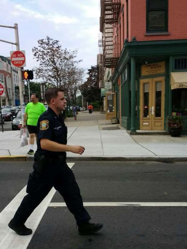 Officer D M Loserov follows the Feast of the Madonna dei Marteri procession through Hoboken.

The fat guy in the lime green shirt has been following me around for years, ruining my pictures.