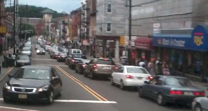 Westbound rush hour traffic in downtown Paterson, New Jersey, USA. Taken at the corner of Main St. &amp;amp; Market St. facing WSW on Market St.