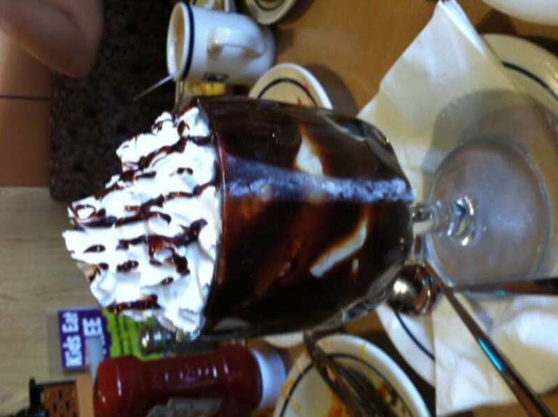 celebrating a friend's birthday with huge glasses of chocolate covered ice cream from iHop