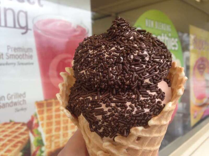 Chocolate ice cream in a waffle come with chocolate sprinkles