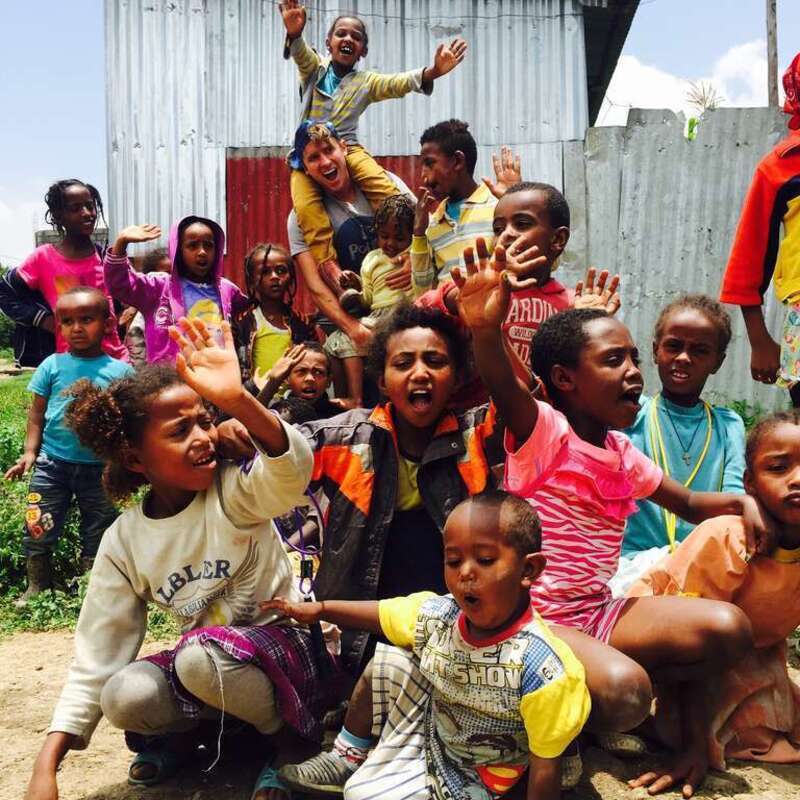 It doesn't matter what neighborhood or country that Justin Mayo is in, children and families have a way of gravitating towards him and the joy he exudes.