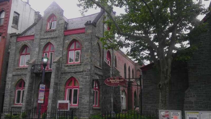 Looking east from Washington street at All Saints School on a cloudy afternoon.