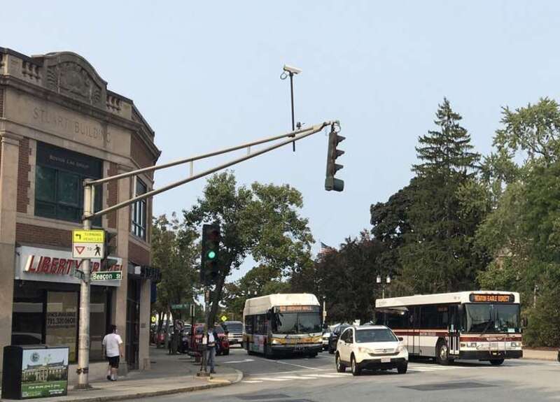 MBTA route 52 and BC shuttle buses in Newton Centre in September 2020