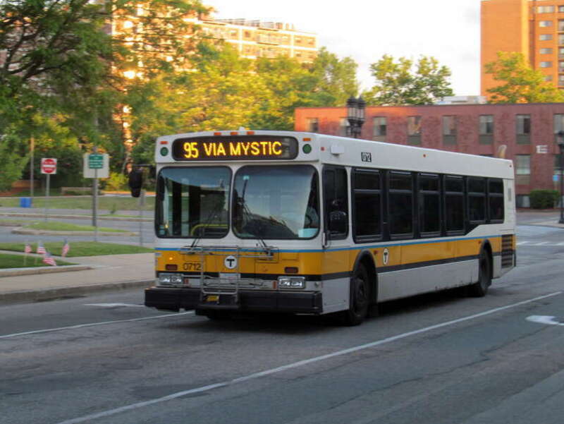 An outbound #95 bus on City Hall Mall at Medford Square in June 2015