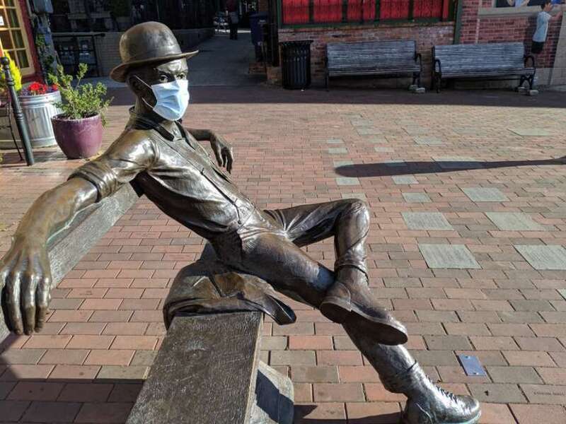 Masked sculpture at Fairhaven Village Green 2020 welcomes me back to Bellingham.