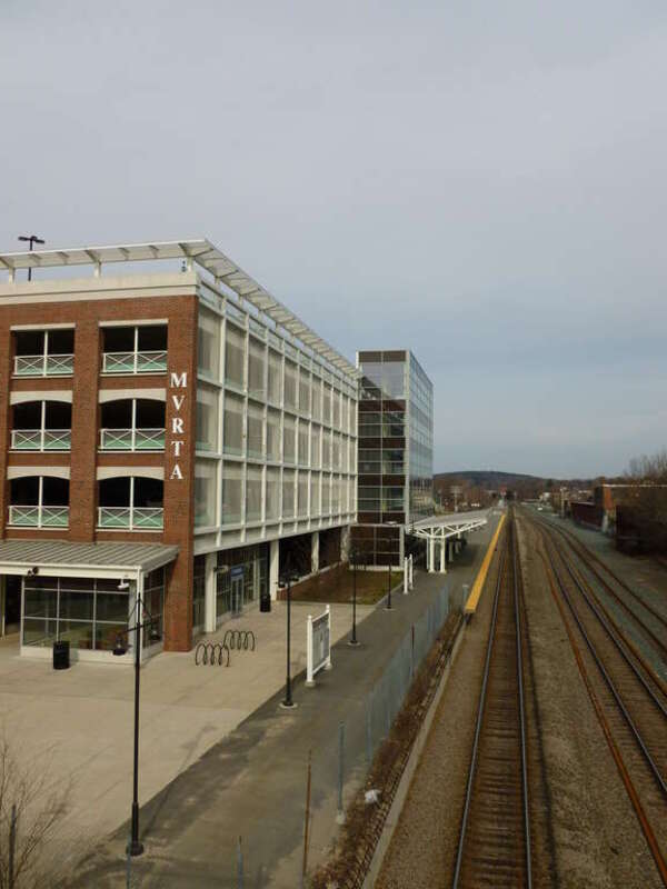 McGovern Transportation Center, and the Haverhill/Reading MBTA line.  The McGovern building is the Lawrence MBTA station.  West and south sides of building shown.