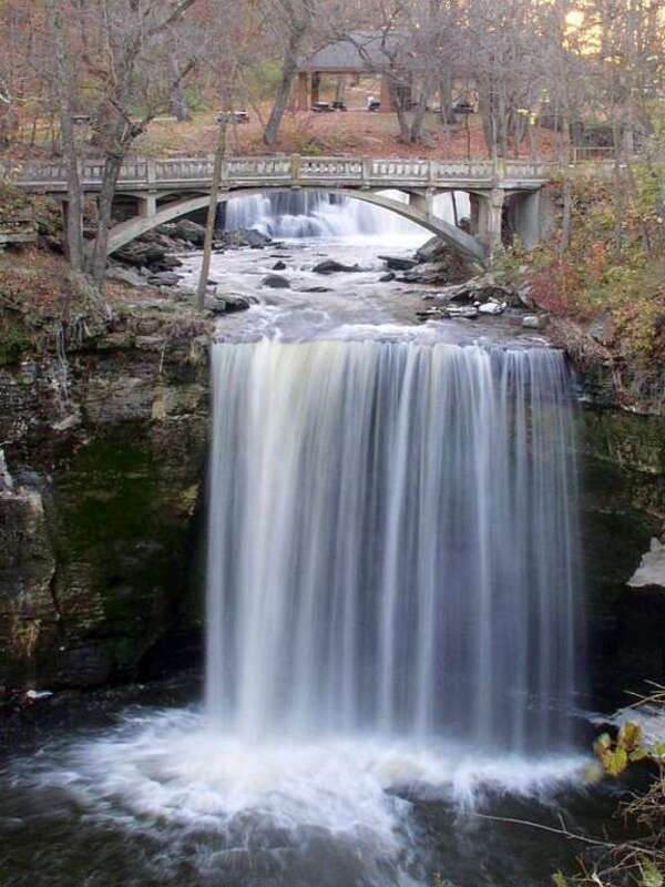 Minneopa Falls, Minneopa State Park, Minnesota, USA. Photo taken at sunset with unusually high water for late fall, several days after a severe thunderstorm.