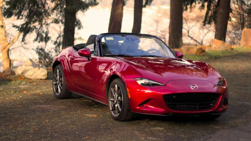 500px provided description: New Years Drive [#red ,#nature ,#drive ,#drift ,#classics ,#mazda ,#dashboard ,#limousine ,#driving ,#driver ,#sports car ,#convertible ,#miata ,#motorcar ,#ragtop ,#passenger vehicle]