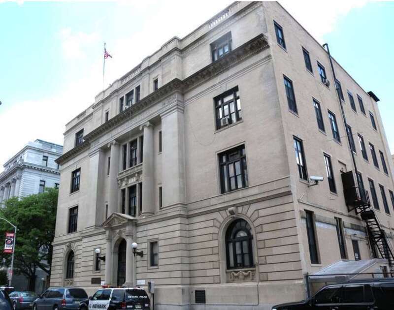 Looking northwest at en:Newark Police Department (New Jersey) headquarters on a sunny midday. See also File:NPD Emer 472 Orange St jeh.JPG