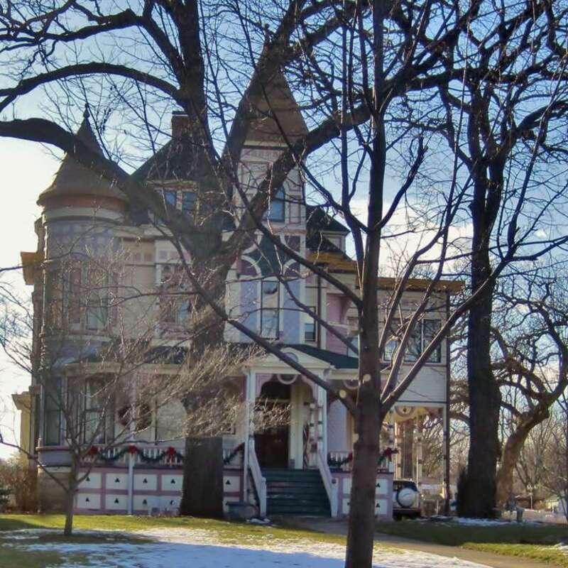 The Ora Pelton House in Elgin (1889). Pelton was a surgeon known for his long career. He graduated from the Unversity of Michigan and Bellevue Hospital Medical College. He practiced for ten years in Elburn, Illinois before moving to Elgin.