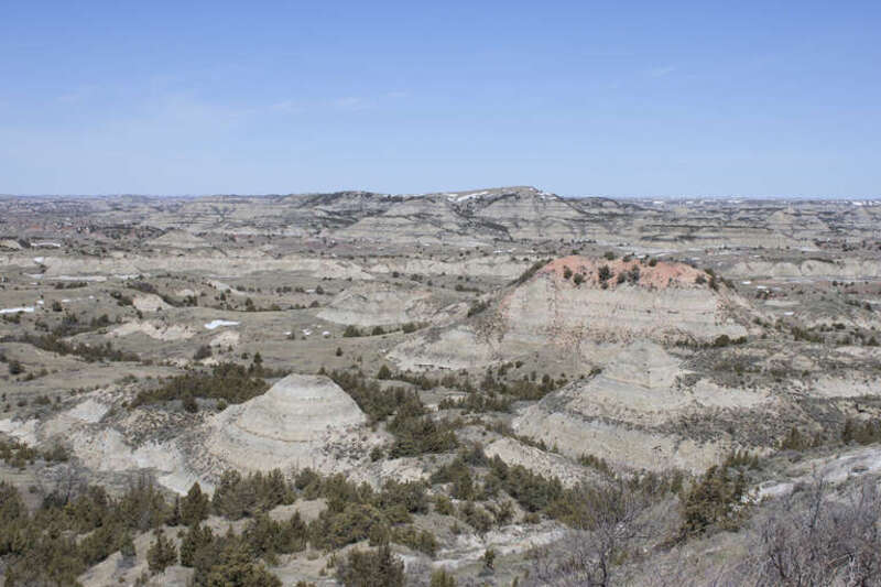 500px provided description: Theodore Roosevelt National Park (South Unit)
Medora

North Dakota [#landscape ,#canon ,#blue sky ,#overlook ,#north dakota ,#creative commons ,#theodore roosevelt national park ,#medora ,#painted canyon ,#attribution