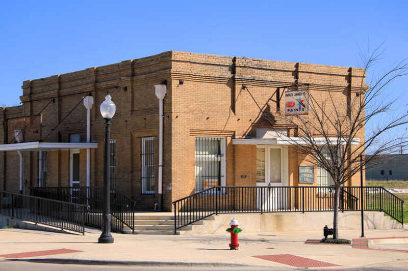 The Parker Lumber Company Complex in Bryan, Texas, United States. The building was listed on the National Register of Historic Places on September 25, 1987