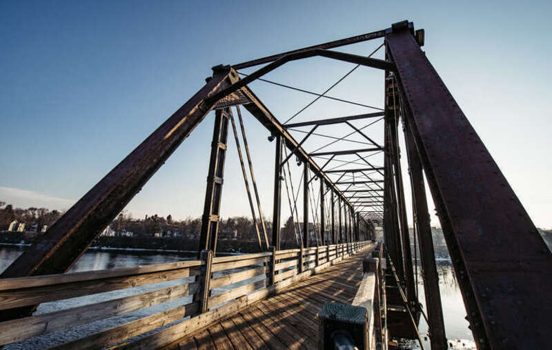 The Phoenix Park Trail Bridge carries the Chippewa River State Trail over the Chippewa River, as seen from Phoenix Park in Eau Claire, Wisconsin, a former rail bridge.

(c) 2018 Tony Webster