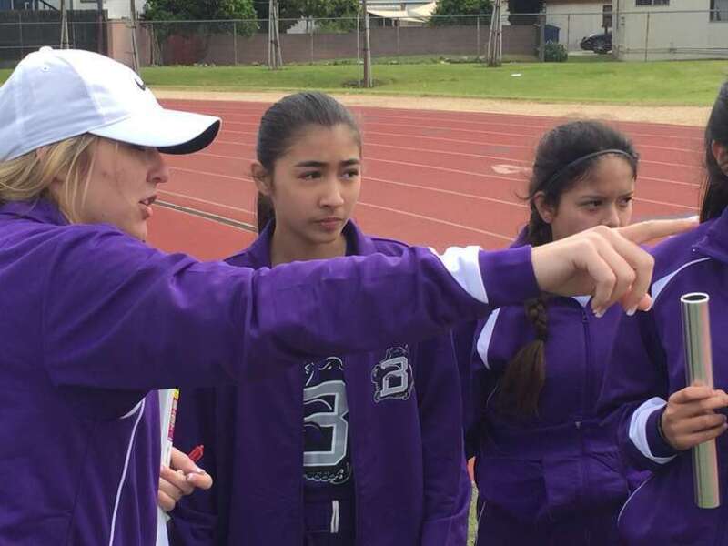 Brooklin Brumund, BHS Athletic Director, with Track &amp;amp; Field Athletes