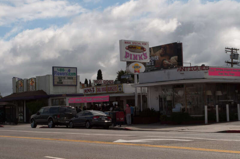 In continuous operation at this location, at the northwest corner of Melrose and La Brea, since 1940, this is the most famous hot dog stand in Los Angeles.

Even though it is a Sunday mid-afternoon, there is quite a bit of a line. Friday and Saturday