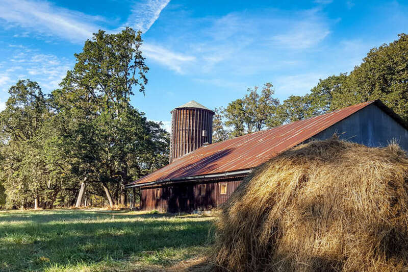 Red barn and haystack at Mt. Pisgah Arboretum, Eugene, Oregon