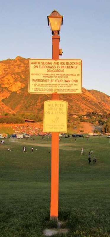 Sign at Rock Canyon Park warning visitors of the danger of water sliding and ice blocking.