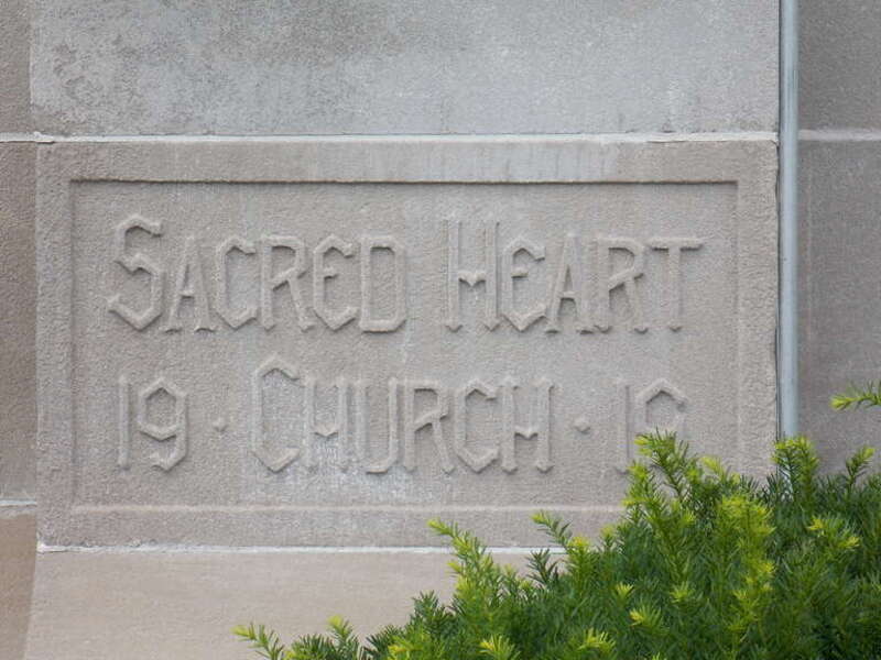 The cornerstone of Sacred Heart Church in Moline, Illinois.