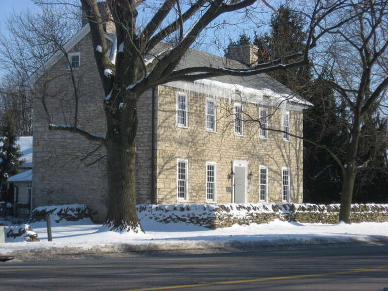 Front and northern side of the Samuel Davis House, located at 4264 Dublin Road south of Dublin in Franklin County, Ohio, United States.  Built in 1816, it is listed on the National Register of Historic Places.