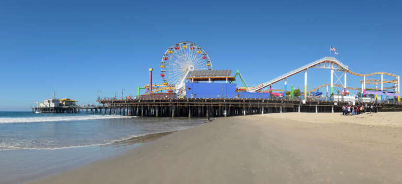The Santa Monica Pier is a large double-jointed pier at the foot of Colorado Avenue in Santa Monica, California that is over 100 years old. With a breakwater constructed in 1934.