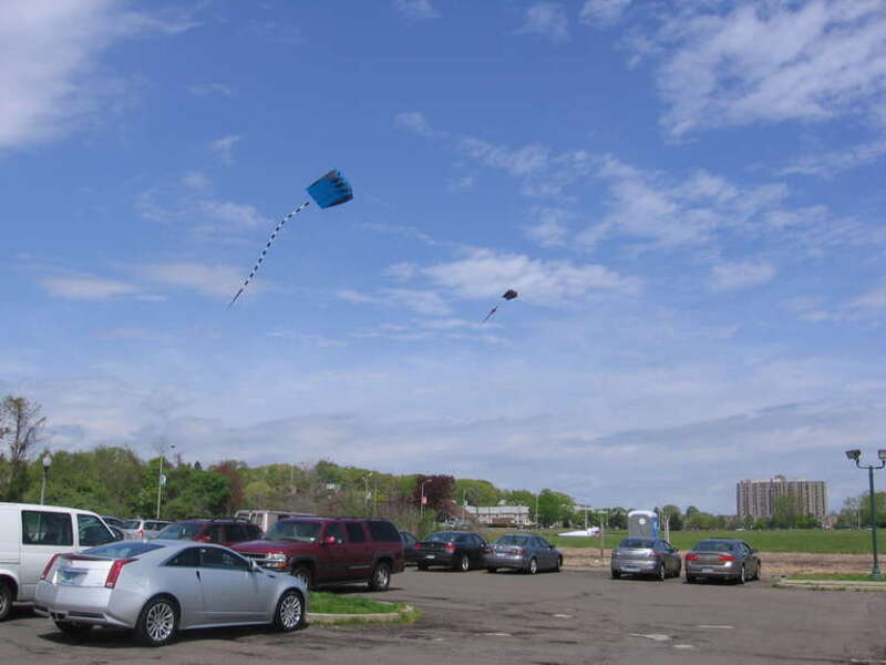 Parafoil kites flying above Savin Rock in West Haven, Connecticut with an onshore breeze coming in off of Long Island Sound.