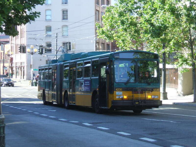 A Metro Transit electric-powered bus breaks down on 2nd Avenue Extension, Seattle, WA, USA. Areas of Downtown Seattle have a legacy network of overhead catenary wires that are still used by traditional bus routes. Occasionally, buses coming down 3rd