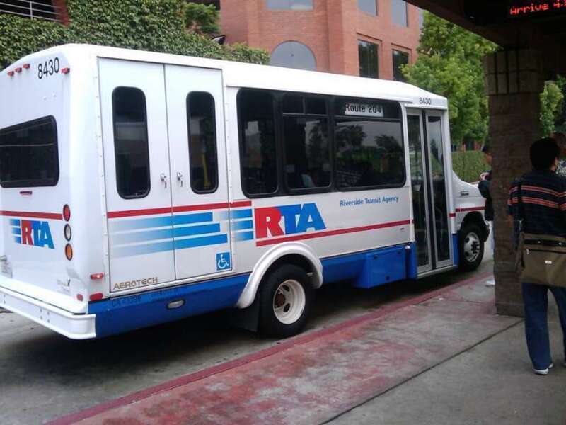 An El Dorado van, #8430, stops briefly at the Downtown Terminal before serving route 204 to Montclair.