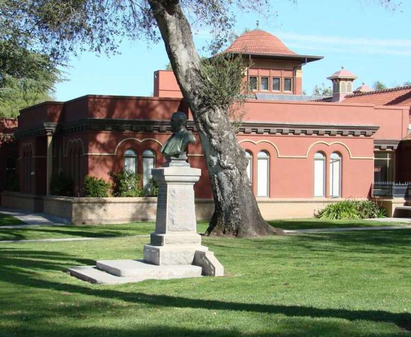 (1 in a multiple picture set)
This is the southwest corner of our beautiful library with a bust commemorating the visit of President McKinley in 1901. Two other presidents have come here: Teddy Roosevelt in 1903 and William Taft in 1909.