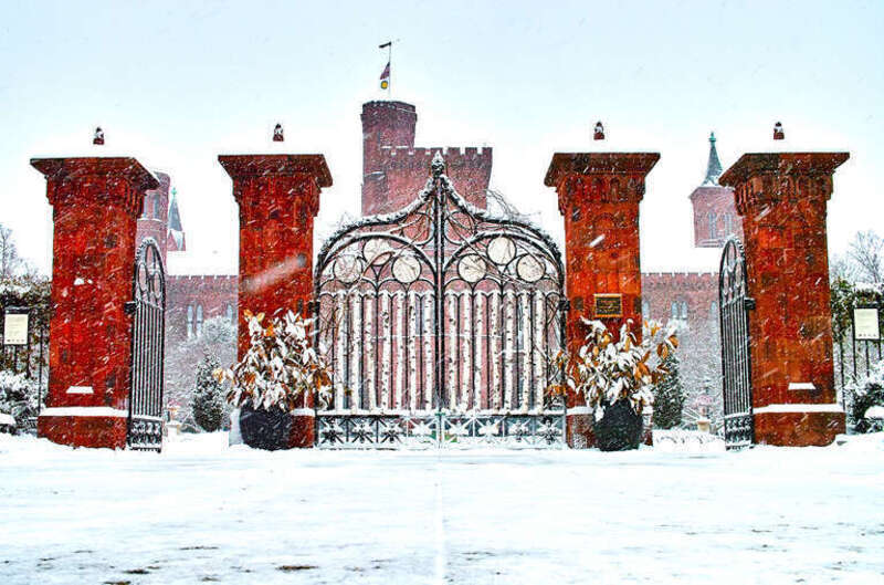 500px provided description: Smithsonian Castle on the National Mall during a snowstorm [#winter ,#architecture ,#gate ,#castle ,#washington dc ,#snowflakes ,#gates ,#snowstorm ,#red brick ,#winter wonderland ,#national mall ,#smithsonian ,#sno]