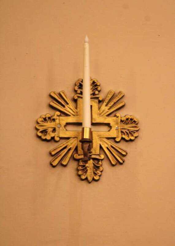 One of the consecration candles in St. John the Evangelist Catholic Church, Second Street in Frederick, Maryland.