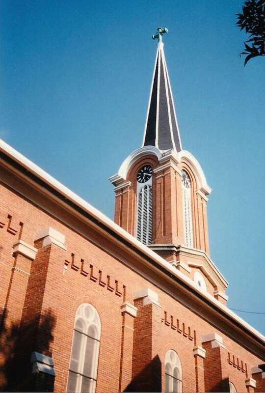 St. Mary's Catholic Church in Iowa City, Iowa from behind the rectory. This is a scan of a photograph taken in 1995.